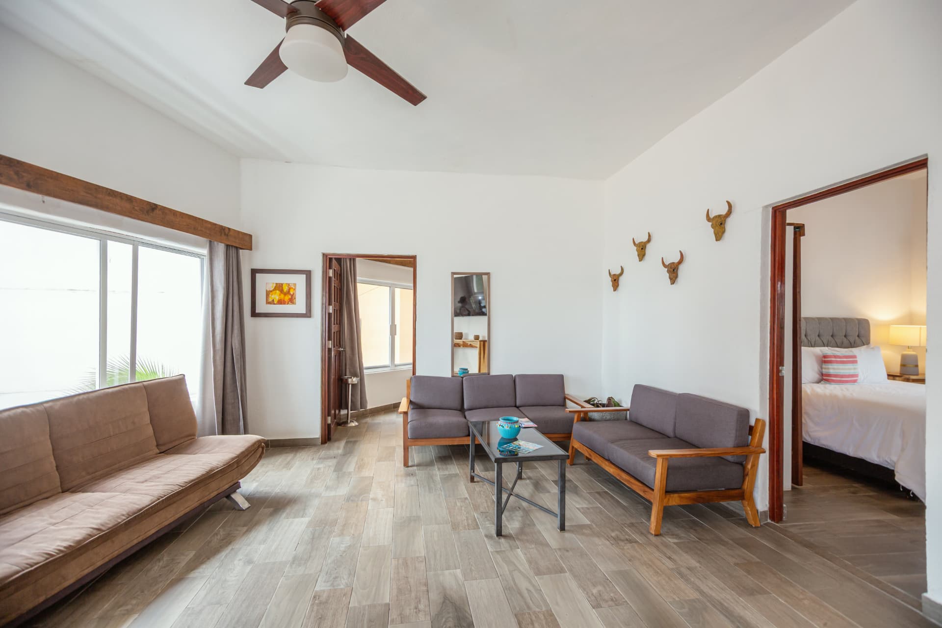 Sala central del Penthouse con acceso a sus dos habitaciones