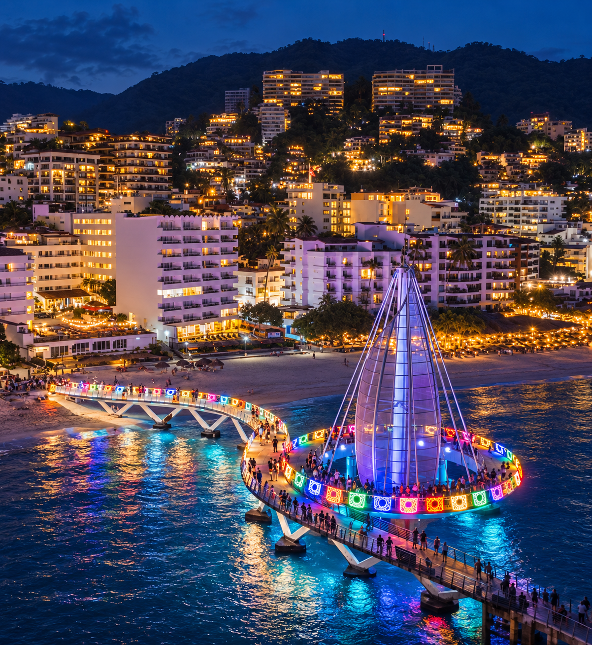 Muelle de Playa Los Muertos decorado con papel picado de Día de Muertos al anochecer
