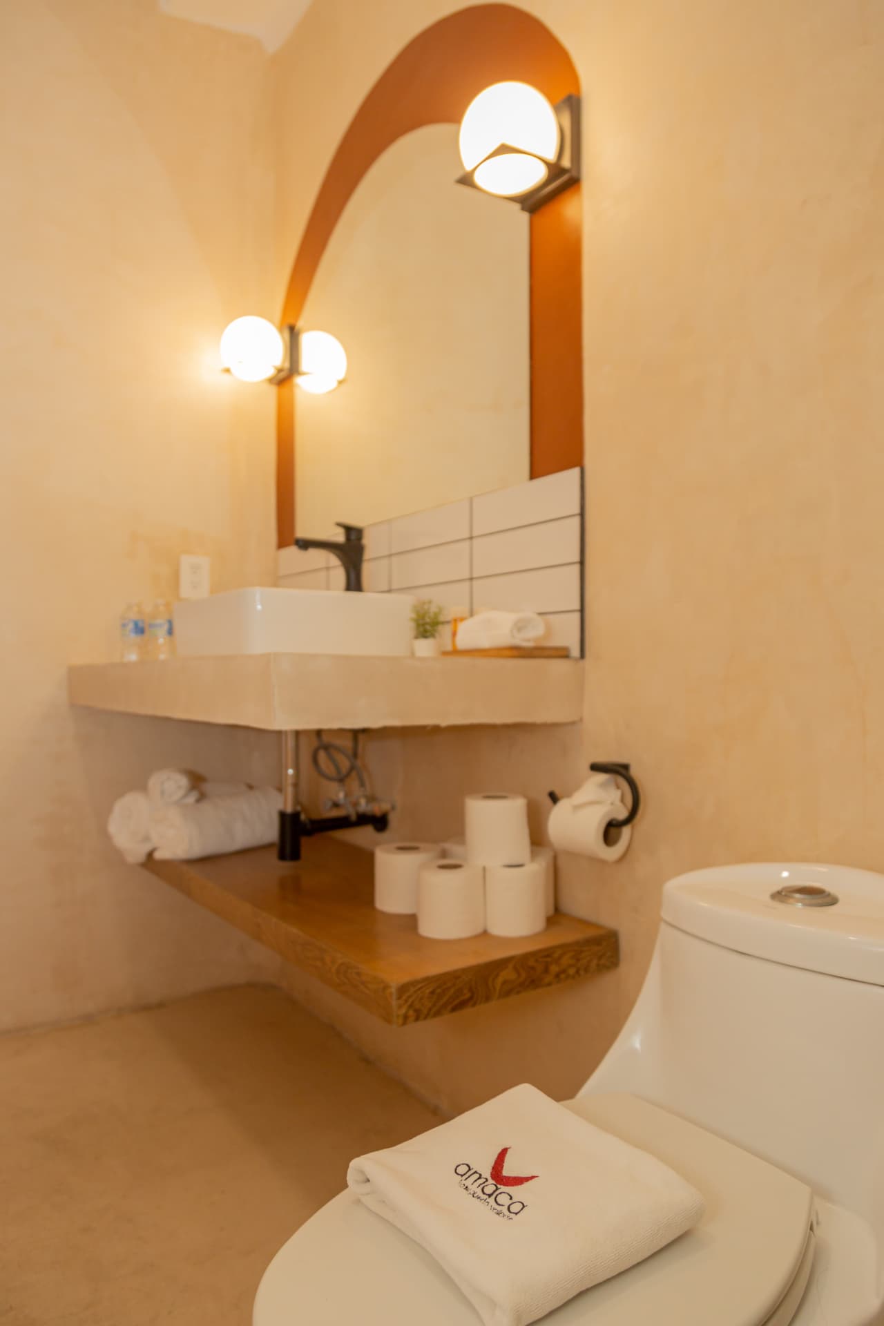Second full bathroom of Amaca Residence with sink, mirror and amenities